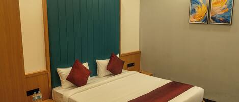 Premium Room, City View | Desk, laptop workspace, blackout drapes, iron/ironing board