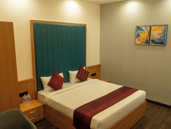 Premium Room, City View | Desk, laptop workspace, blackout drapes, iron/ironing board