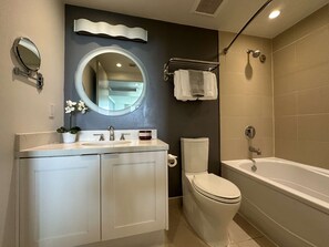 Shower, hair dryer, towels