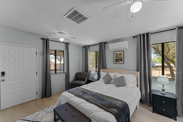 Primary Bedroom & Rear Entry