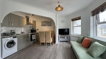 Apartamento | Área de estar | TV de tela plana