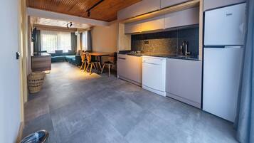 Family Duplex, Balcony, Garden View | Private kitchen | Coffee/tea maker, highchair