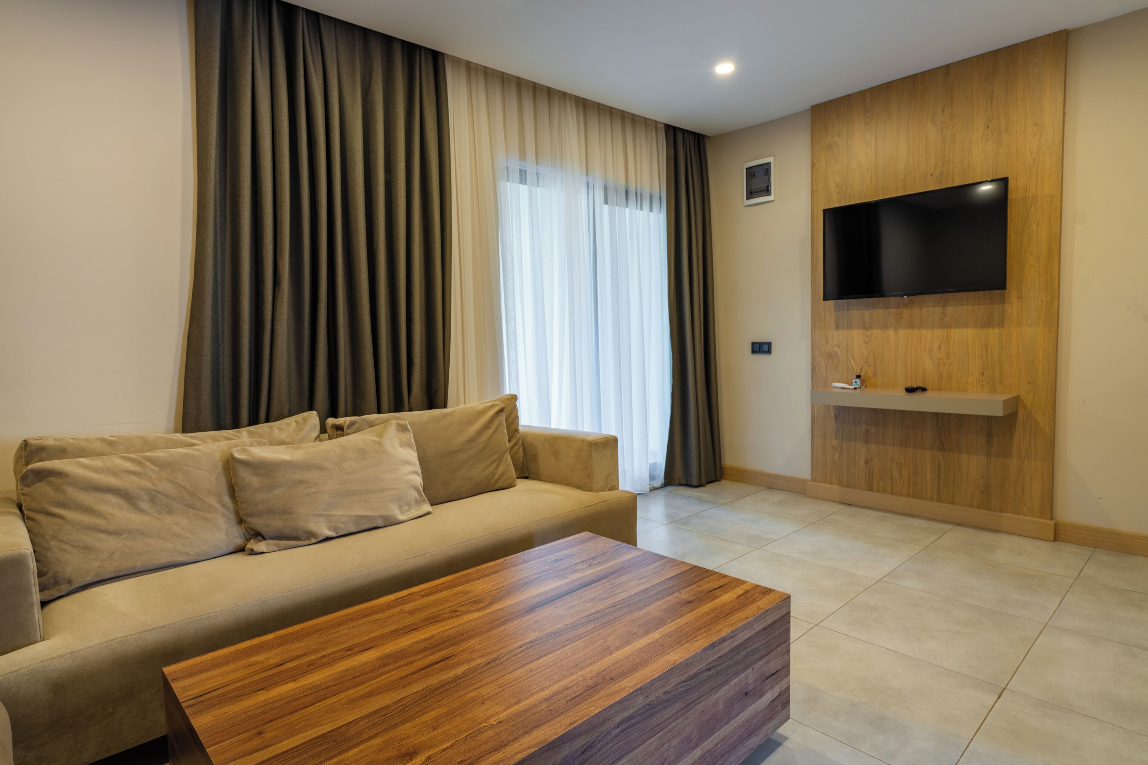 Family Apartment, Balcony, Garden View | Living area | 43-inch Smart TV with satellite channels, Netflix, streaming services