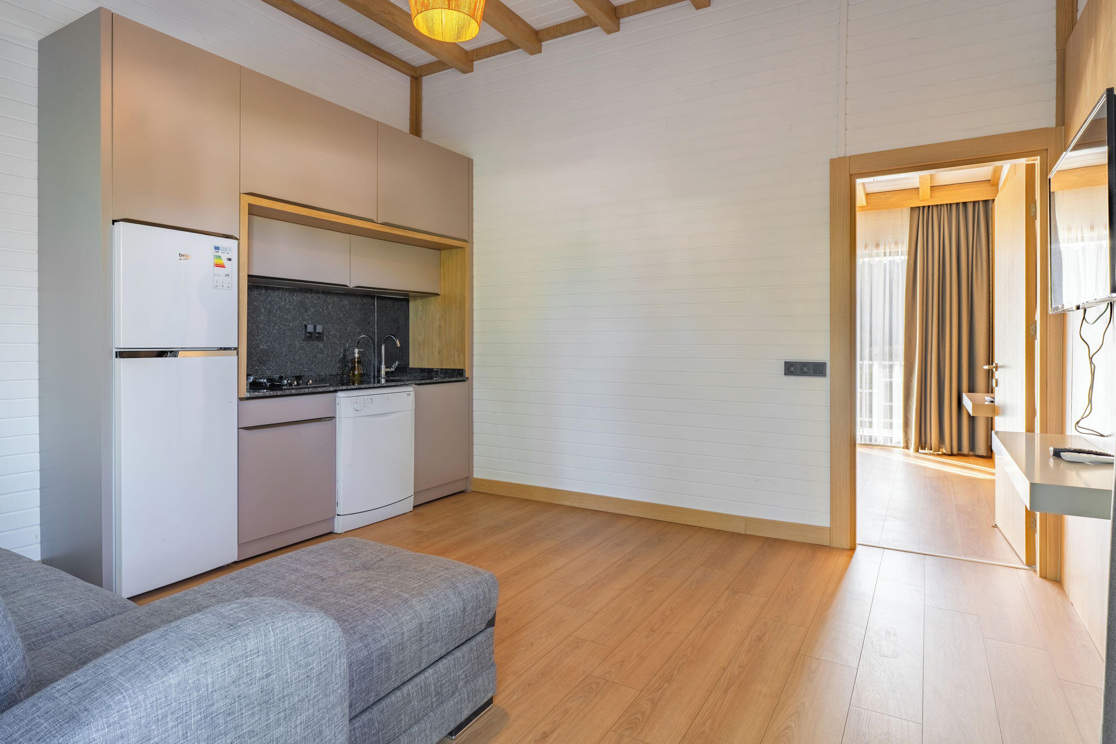 Family Apartment, Balcony, Garden View | Private kitchen | Coffee/tea maker, highchair