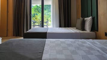 Deluxe Room, Multiple Beds | Premium bedding, minibar, in-room safe, desk