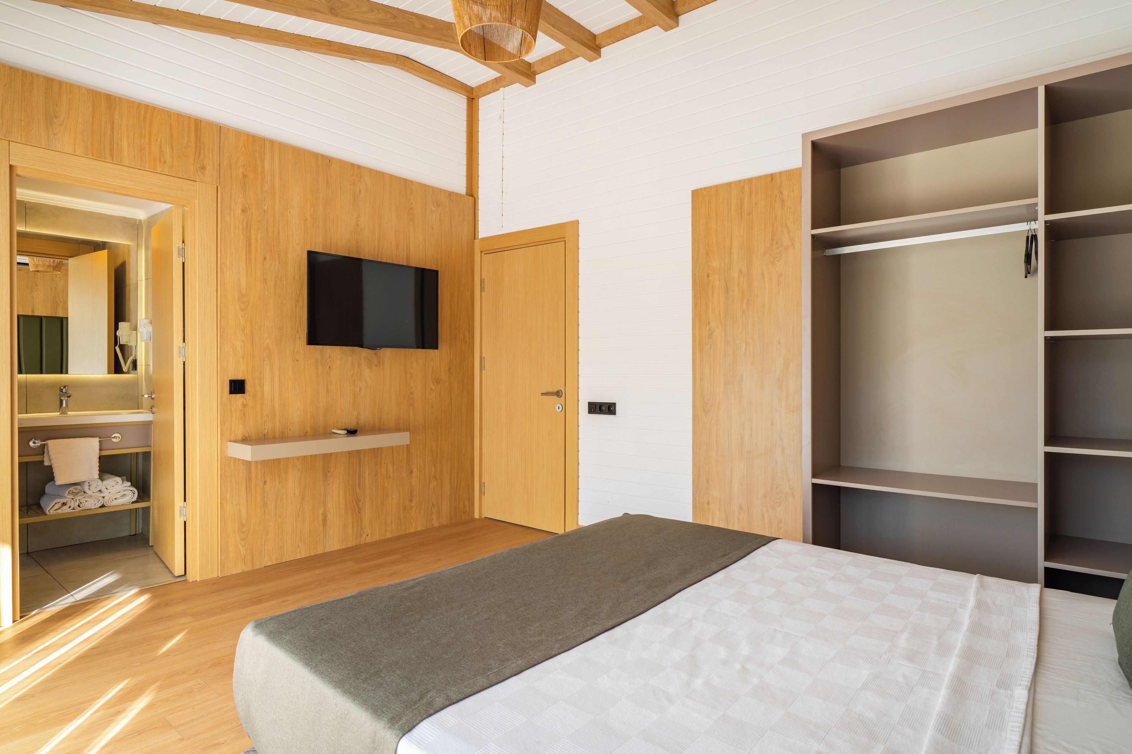 Family Apartment, Balcony, Garden View | Premium bedding, minibar, in-room safe, desk