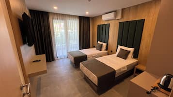 Quarto luxo, várias camas | Roupas de cama premium, frigobar, cofres nos quartos, escrivaninha