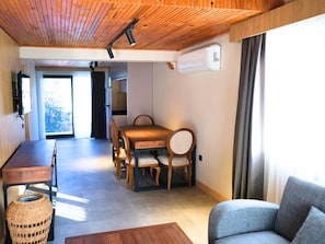 Family Duplex, Balcony, Garden View | Living area | 43-inch Smart TV with satellite channels, Netflix, streaming services