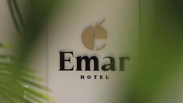 A staircase leading to a room with a sign reading "Emar Hotel". - Emar Hotel (Tirana)