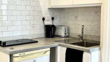 Apartment | Private kitchen | Fridge, microwave, stovetop, electric kettle