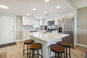 Fridge, microwave, oven, stovetop - Oceanfront 1st-Floor Oasis: Steps to Pool & Beach (Fernandina Beach)