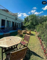 Family Double Room | Living area | 43-inch LCD TV with satellite channels