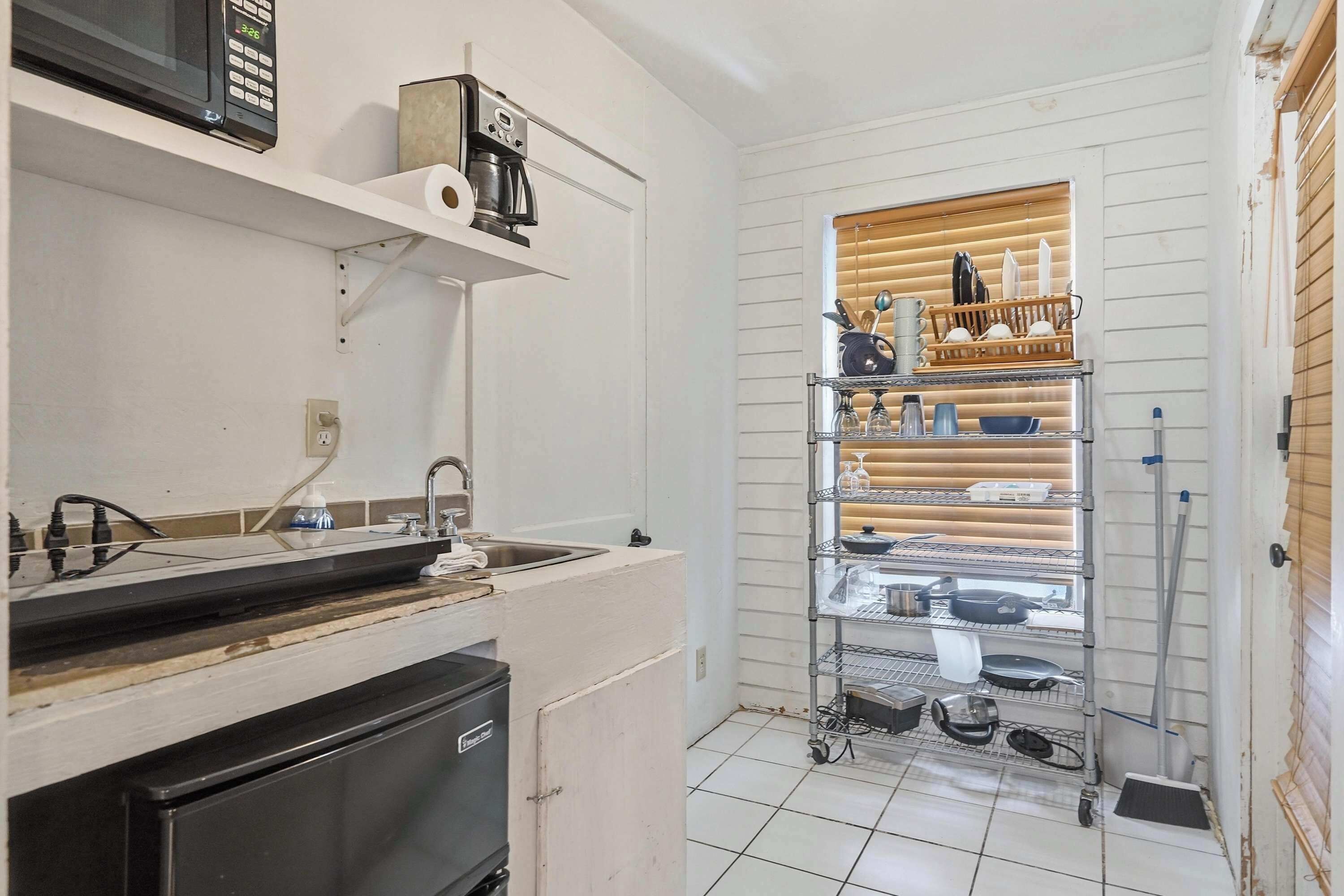 Fridge, microwave, coffee/tea maker, toaster
