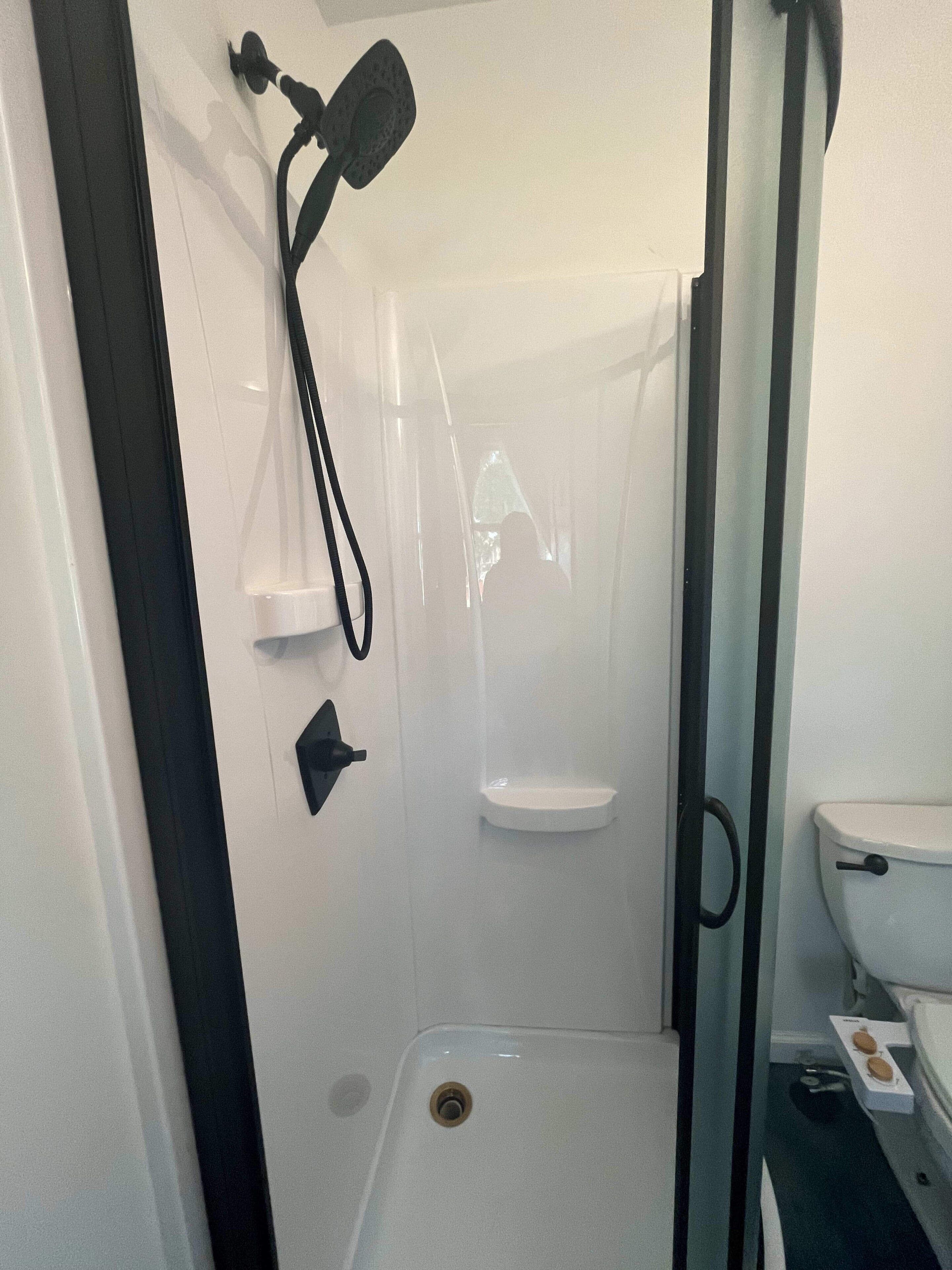 Shower, hair dryer, towels