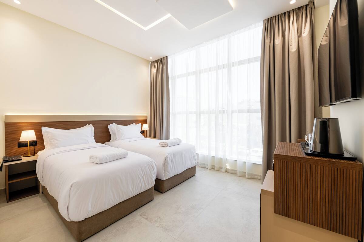 Double or Twin Room, City View | Iron/ironing board (on request), WiFi (free)