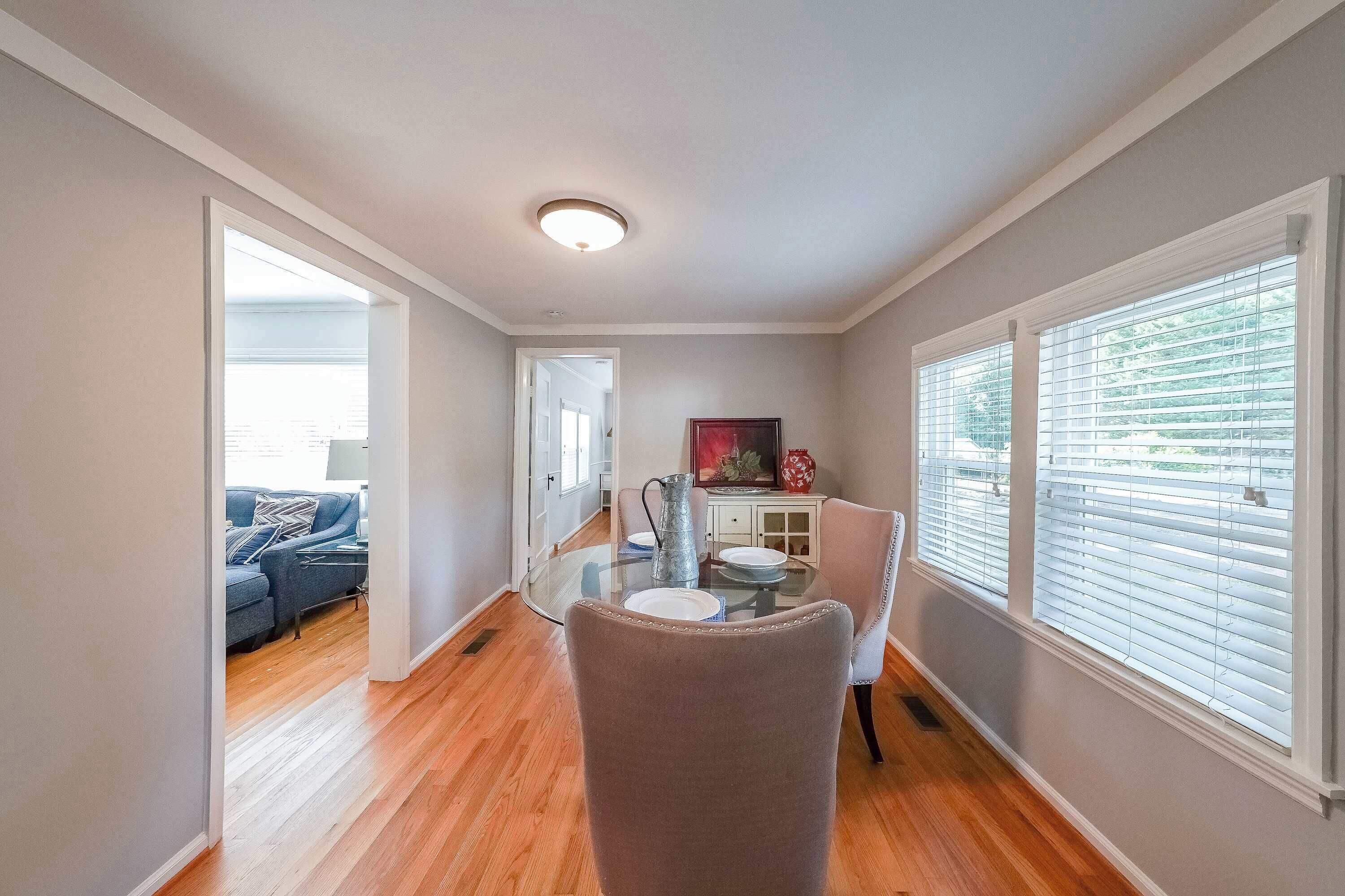 House, 2 Queen Beds, Fireplace, Garden View (Kennesaw Cottage) | Living area | 75-inch flat-screen TV with digital channels, TV