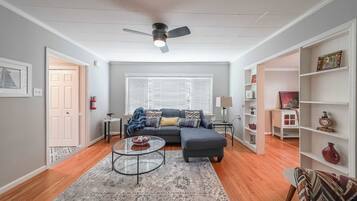 House, 2 Queen Beds, Fireplace, Garden View (Kennesaw Cottage) | Living area | 75-inch flat-screen TV with digital channels, TV