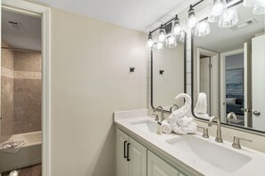 Shower, eco-friendly toiletries, hair dryer, towels