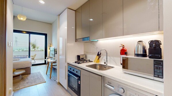 Microwave, stovetop, coffee/tea maker, toaster