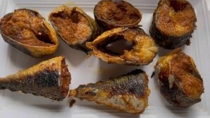 A tray of fried fish with charred skin. - Sleeps 2 With Free Parking and Wi-fi (Birmingham)