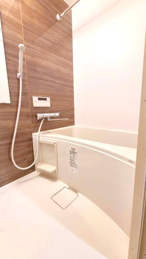 Basic Apartment | Bathroom | Hair dryer, towels, soap, shampoo - Sky Building Umeda (Osaka)