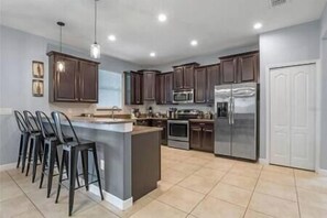 Fridge, microwave, oven, stovetop - The Marvel Mansion 6BR Resort Pool Home Near Disney (Four Corners)