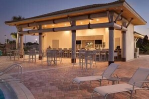 Outdoor dining - The Marvel Mansion 6BR Resort Pool Home Near Disney (Four Corners)