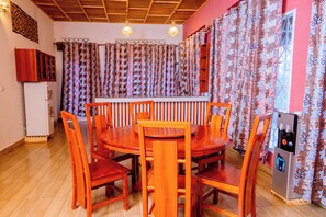 Apartment, 2 Bedrooms | Dining room - Future4kids Kinigi Guest House By Isange Paradise Resort (Musanze)