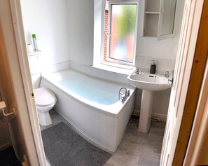 Shower, towels, toilet paper