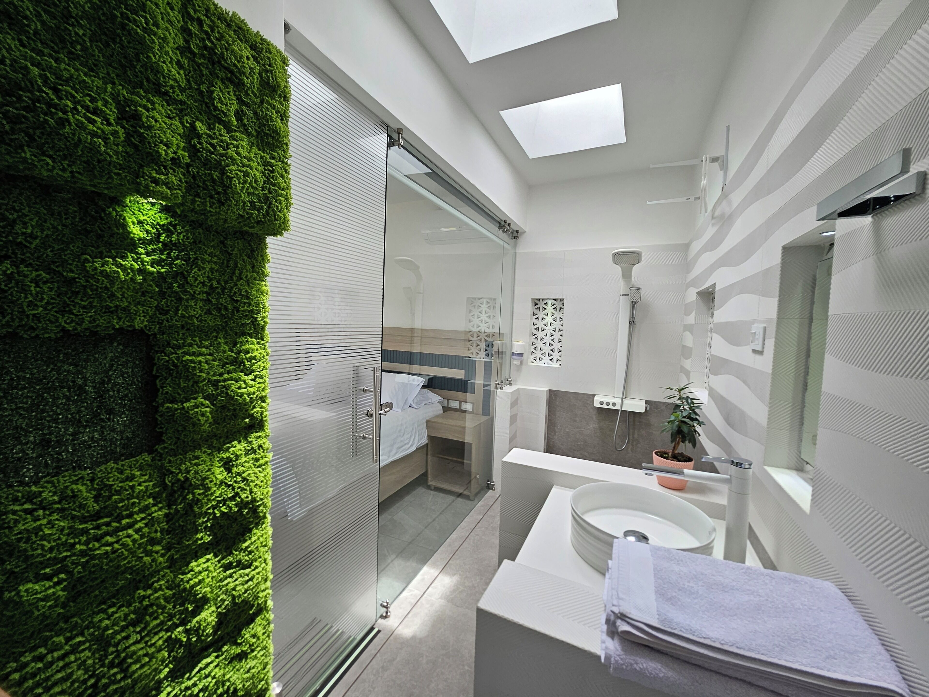 Shower, rainfall showerhead, towels