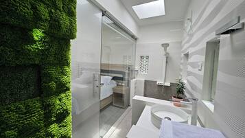 Shower, rainfall showerhead, towels
