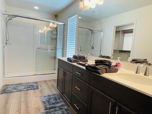 Shower, hair dryer, towels, soap