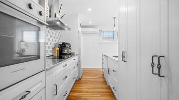 Fridge, microwave, dishwasher, coffee/tea maker