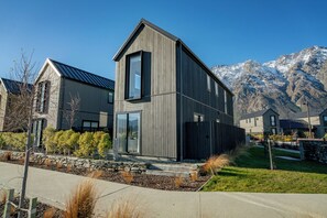 Situated in a scenic location with breathtaking views of snow-capped mountains, this property offers a unique blend of style and serenity.