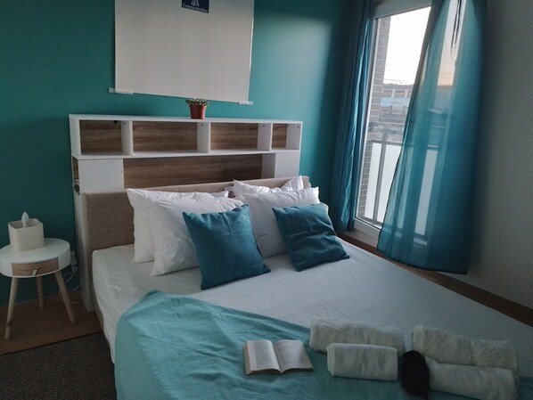 1 habitación, tabla de planchar con plancha, wifi y ropa de cama 