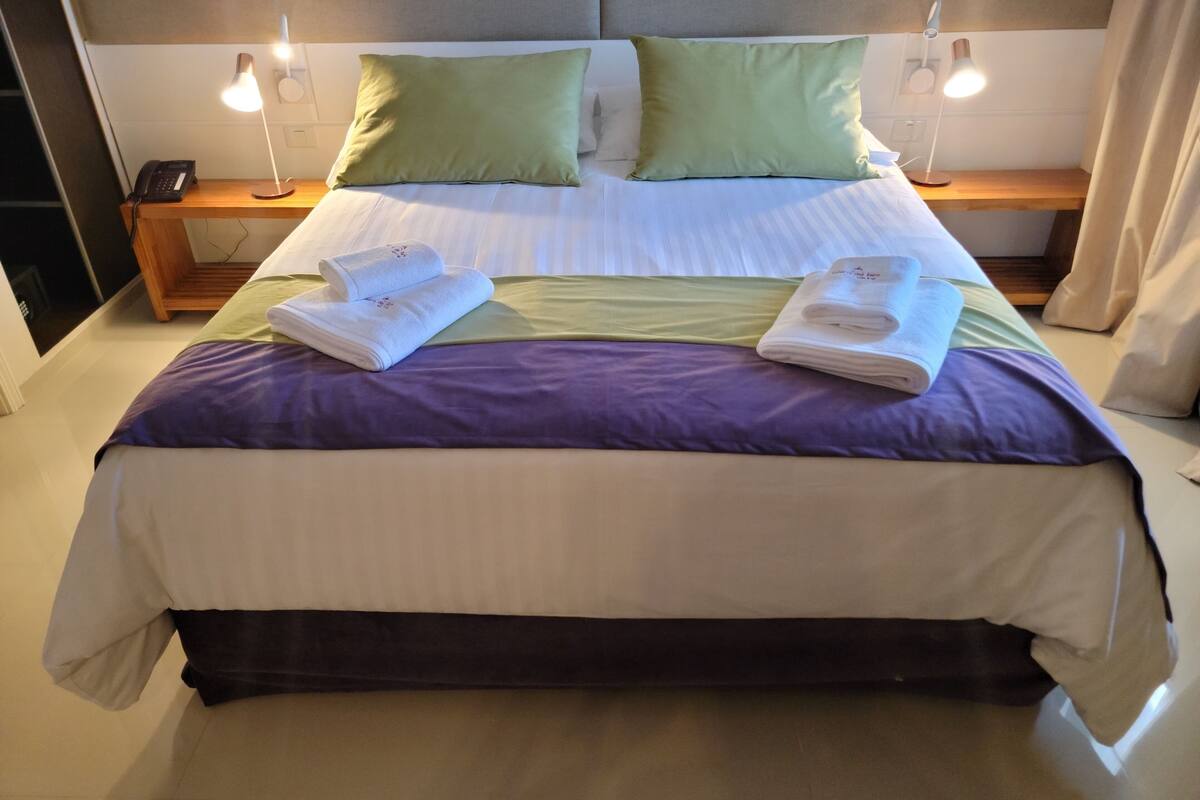 Deluxe Double Room, 1 King Bed, Balcony, Beach View | Egyptian cotton sheets, premium bedding, down comforters