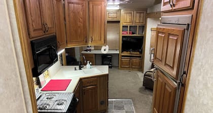 Enchanting camper-cabin life in small town Chapman Kansas with all amenities