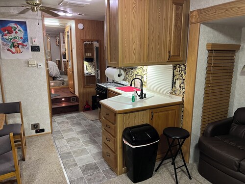 Enchanting camper-cabin life in small town Chapman Kansas with all amenities 