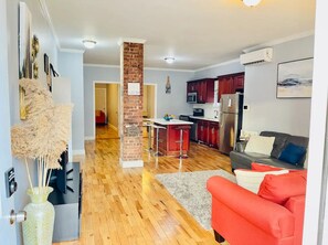 Living area - Cozy 2-bedroom house in welcoming The Bronx with AC, WiFi (The Bronx)
