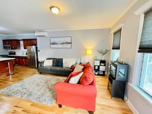 Living area - Cozy 2-bedroom house in welcoming The Bronx with AC, WiFi (The Bronx)