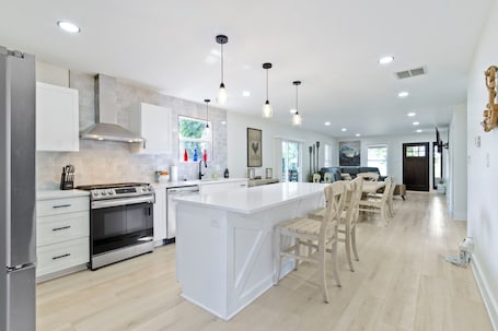 Fridge, microwave, oven, stovetop. Rustic meets Modern Downtown Retreat with Air hockey table