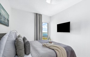 2 dormitorios, tabla de planchar con plancha, cuna de viaje