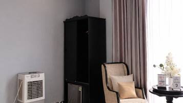 Junior Studio Suite, 1 Queen Bed, City View | Blackout curtains, soundproofing, iron/ironing board (on request)