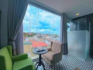 Junior Studio Suite, 1 Queen Bed, City View | Blackout drapes, soundproofing, iron/ironing board, free WiFi