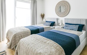 2 slaapkamers, een strijkplank/strijkijzer, reisbedje, gratis wifi