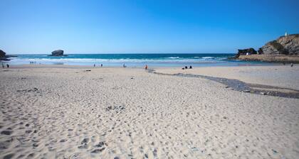 Situated only sixty meters from the Blue Flag sandy beach in the charming coastal village of Porthto
