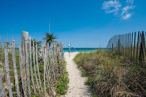 On the beach, sun loungers, beach towels