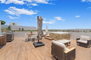 Outdoor dining - Stunning Penthouse with Private Terrace & Jacuzzi Views (Cabo San Lucas)
