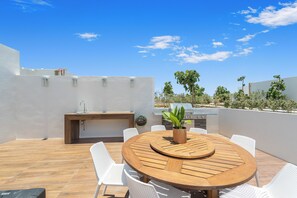 Outdoor dining - Stunning Penthouse with Private Terrace & Jacuzzi Views (Cabo San Lucas)