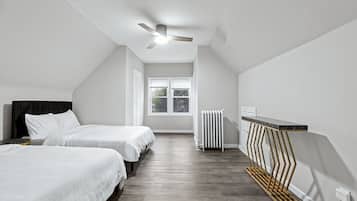 1 bedroom, desk, iron/ironing board, travel crib